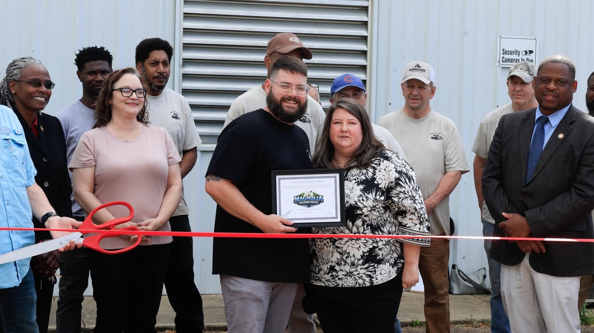 Magnolia Collision Center grand opening ribbon cutting